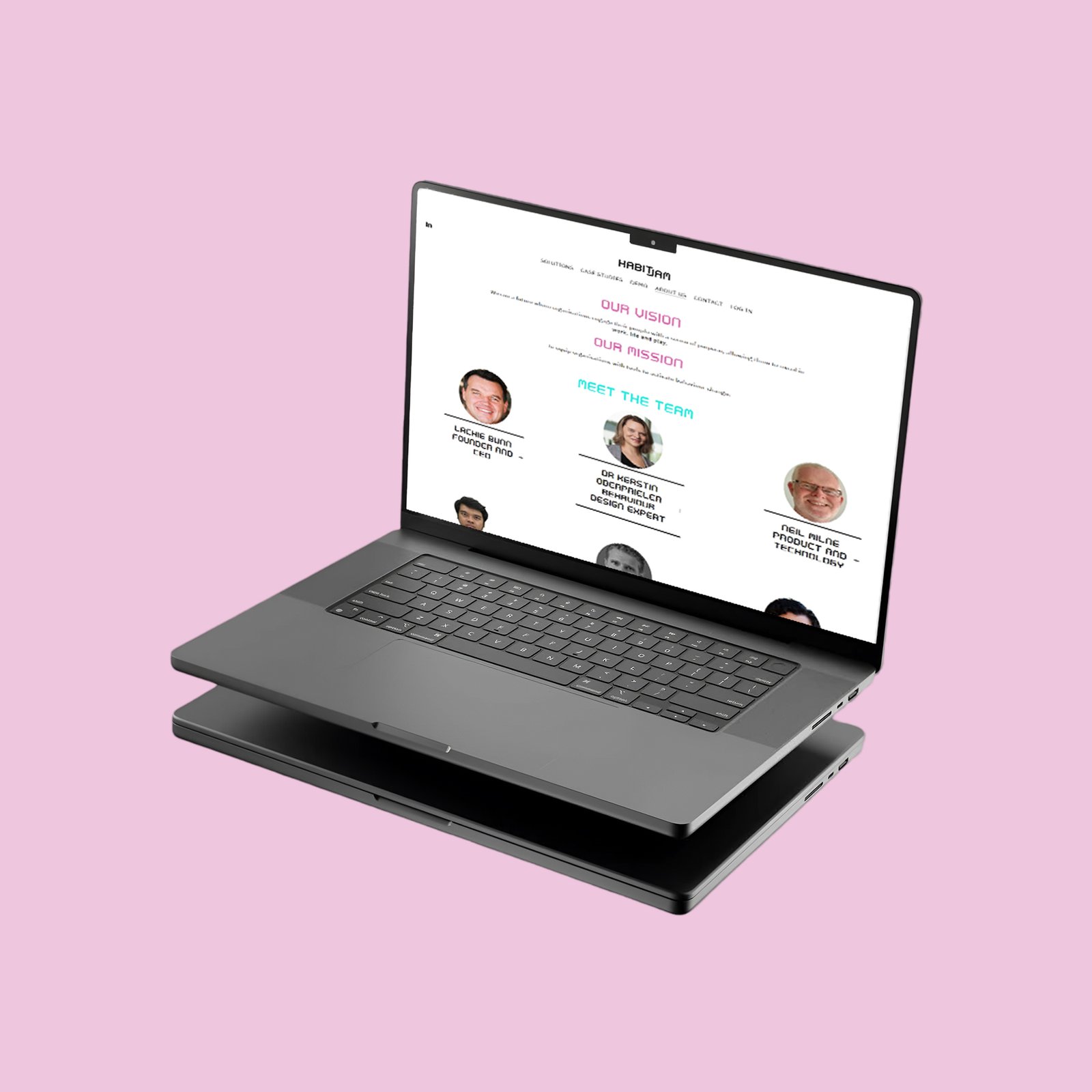 A laptop displayed on a pink background, symbolizing Habitjam's focus on healthcare innovation and technology.