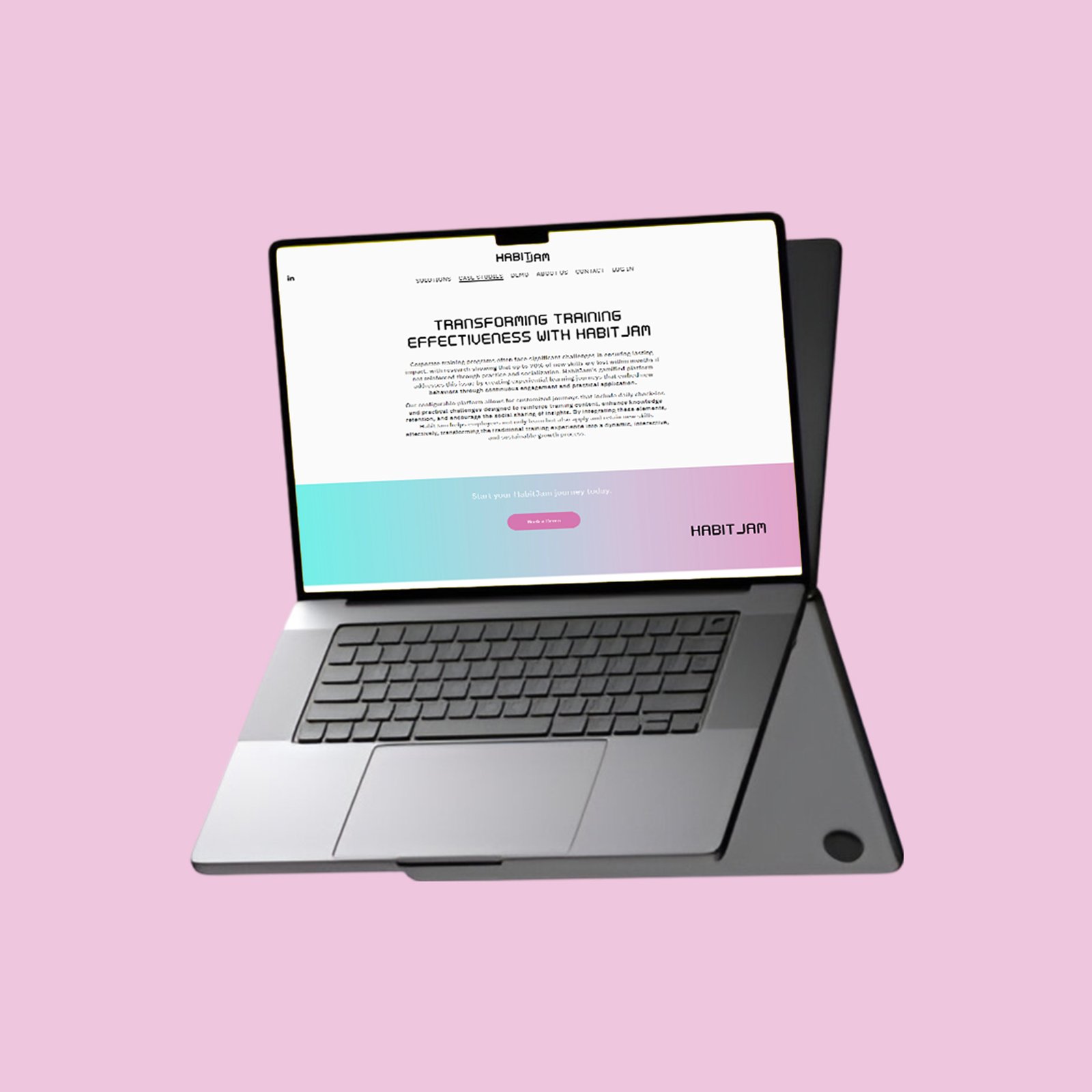 A laptop on a pink background, illustrating Habitjam's integration of technology in the healthcare sector